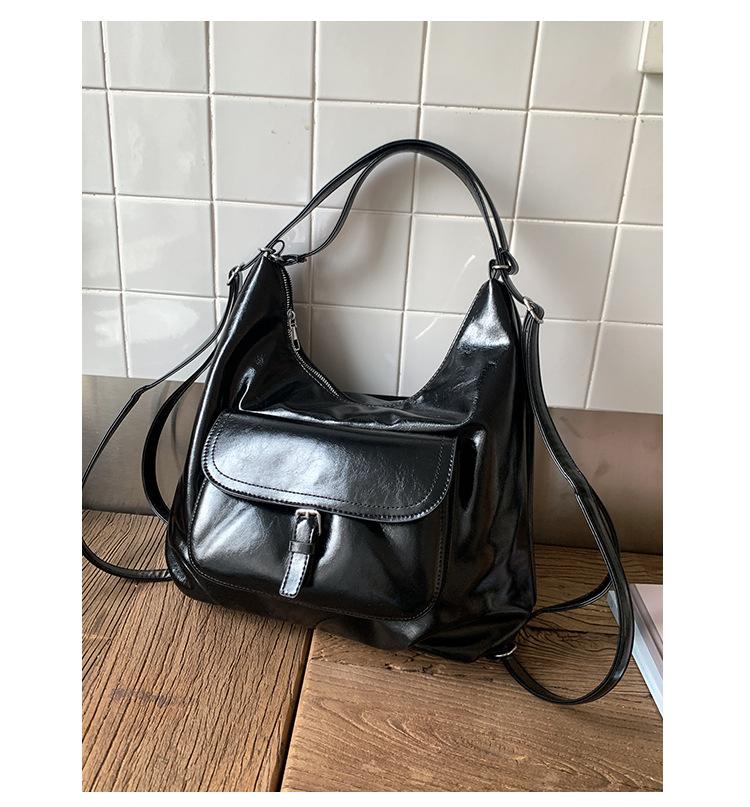 

2025 new Korean simple large-capacity tote bag women s fashion oil wax leather shoulder bag casual texture backpack чорний
