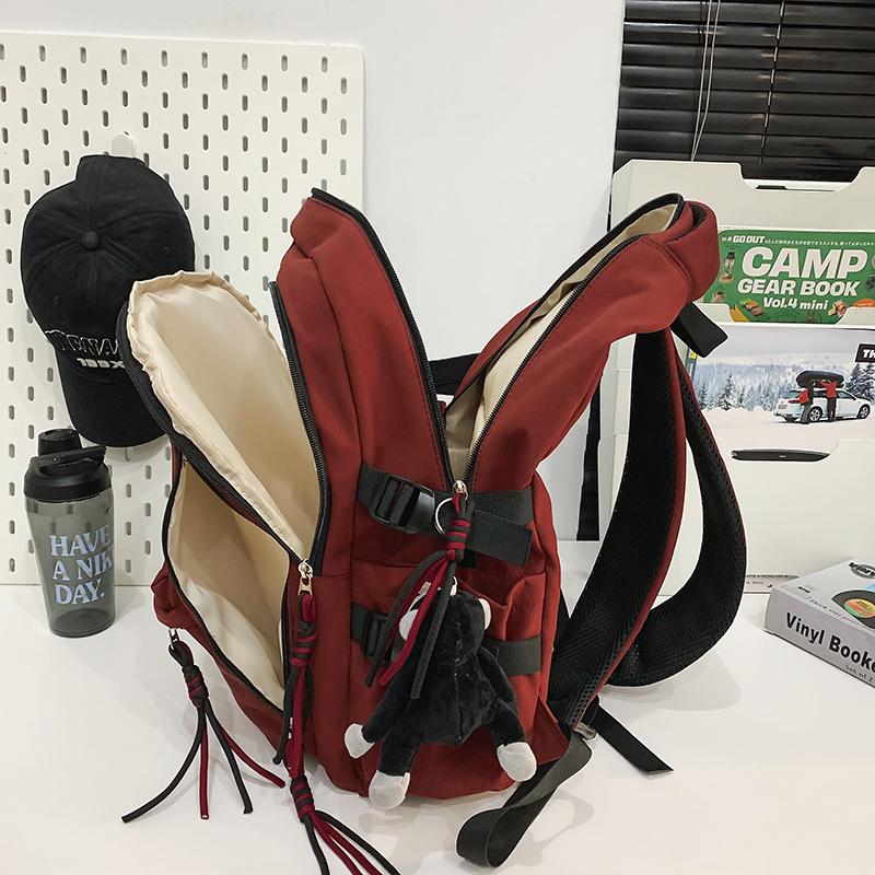 Ryggsäck för män i enfärgat utförande Ryggsäck för kvinnor med flera fickor Stor kapacitet Student Skolväska