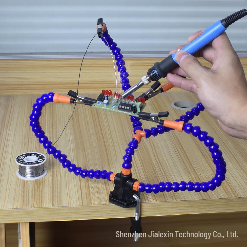 Four-Jaw Soldering Station with Flexible Arm and PCB Holder for Multifunctional Welding and Model Repair.