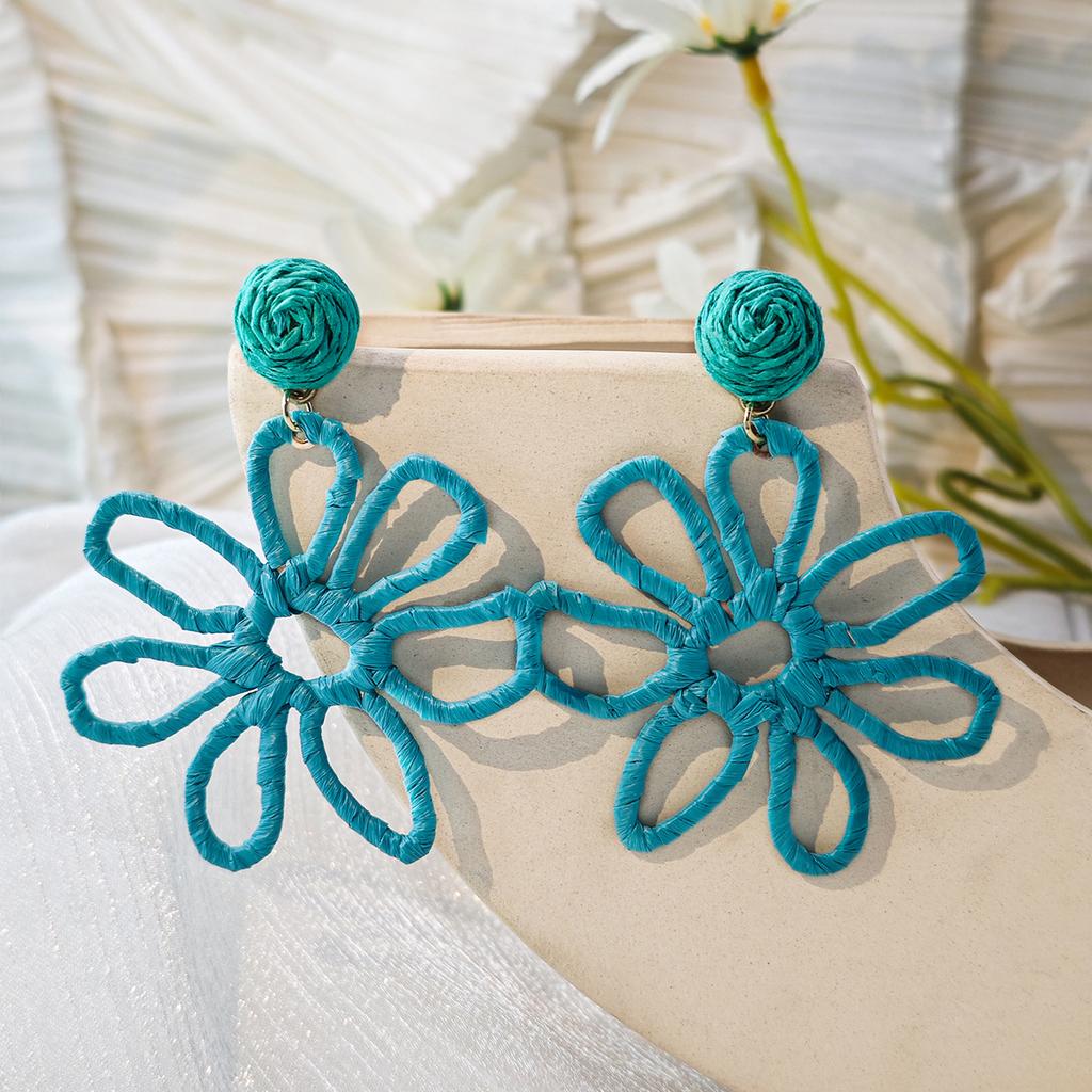 European and American cross-border summer vacation style earrings women, personalized color hand-woven raffia hollow flower earrings