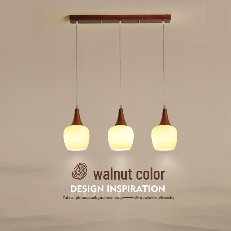Modern Solid Wood Pendant Lamp with Three Heads, Walnut Finish, Japanese Style for Dining Rooms and Bars.