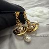 Elegant Saturn Pearl Tassel Earrings for Women