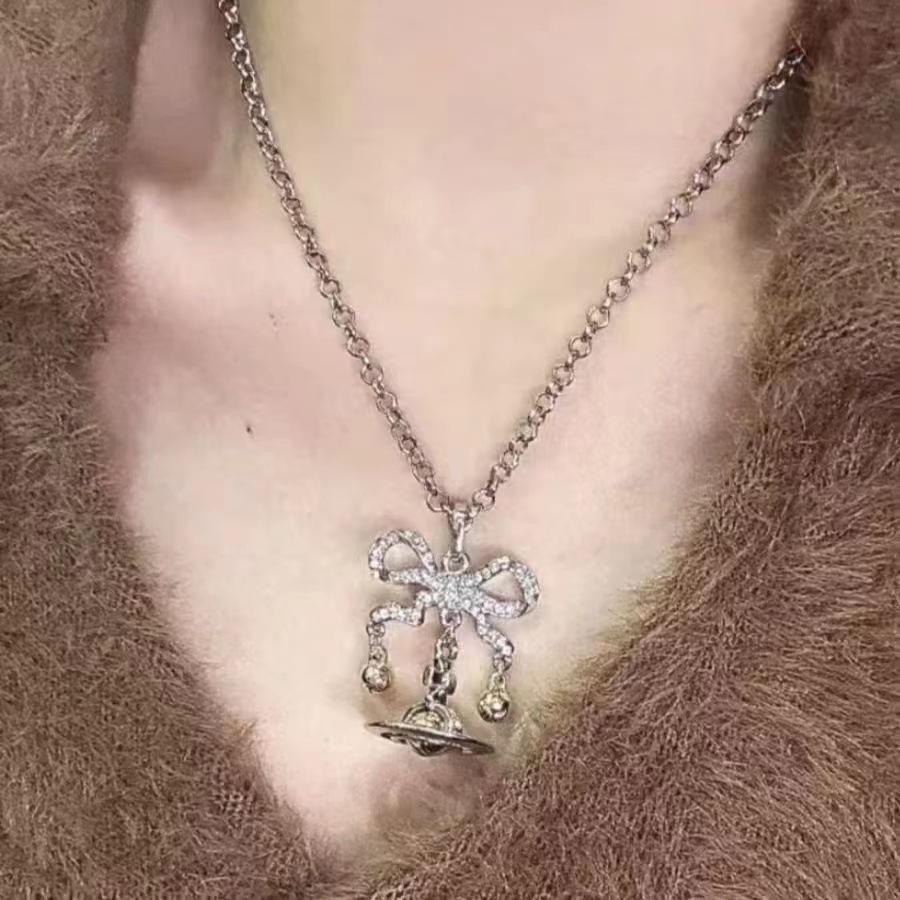 Kaiserinwitwe Cixi Silberne Weihnachtsklingel Brosche & Halskette mit Saturn-Schleife - Eleganter High-End Schmuck für Damen