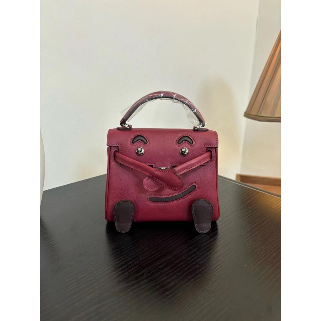 Borsa a faccina sorridente nuova per la primavera e l'estate 2025 borsa Kelli mini in pelle bovina di primo strato di alta gamma borsa a tracolla carina da millenial