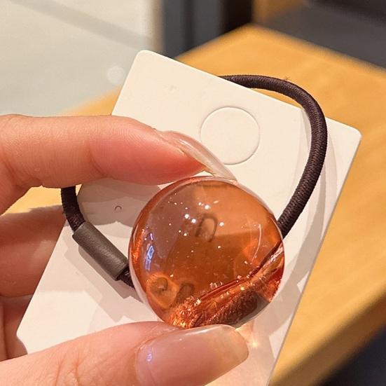 2er-Pack transparente Haargummis im Jelly-Ball-Design, hochelastisch, schonend für Pferdeschwänze und Haarknoten.