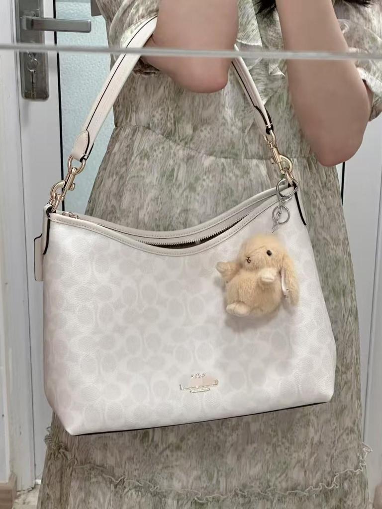 Coach Laurel Hobo Bag: Versatile, Large-Capacity Shoulder, Crossbody, and Handbag for Women.