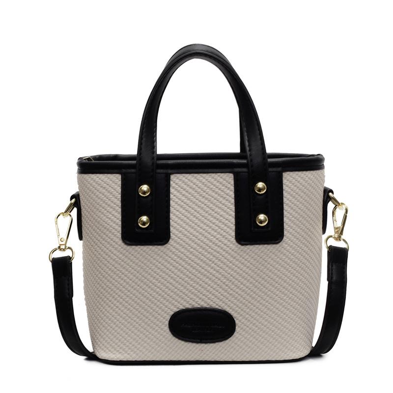 Spring new Korean version casual contrasting color fashionable portable bucket bag women's commuting versatile simple shoulder messenger bag