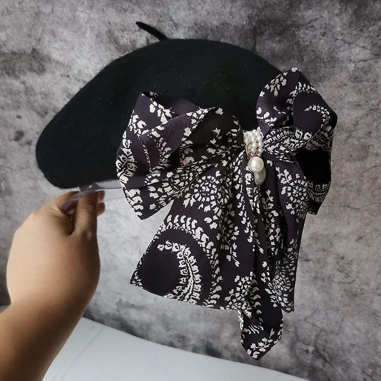 

Весна и осень Новинка Тысяча птиц Клетчатый бант Шерстяной берет Женственная лента Тыквенная шляпа Шерстяная шляпа художника