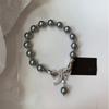 Tahiti Black Shijia Pearl Zircon Bow Pendant Pearl Necklace Fashion Temperament Bracelet Sweater Chain
