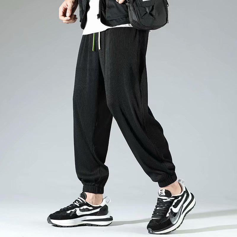 

Мужские повседневные брюки из 9-точечного материала в корейском стиле из однотонного ледяного шелка 5XL чёрный