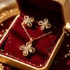 Luxurious Gold-colored Copper Base Set with Synthetic Zircon Necklace and Earrings for Women Exquisite Water Drop Diamond Hollow Flower Jewelry