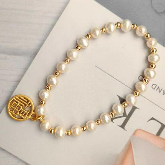 

Adjustable Women s Pearl Bead Bracelet with Gold Brass Sand Beads and Elastic Cord Design