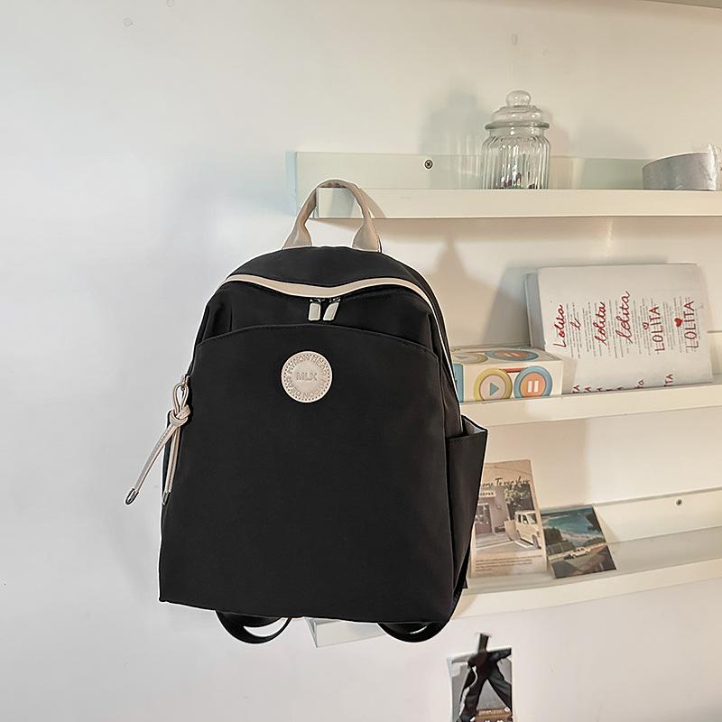 Lightweight and simple student backpack casual versatile lightweight travel shopping backpack