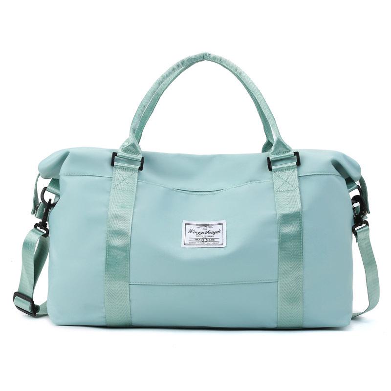 

Women s Lightweight Waterproof Gym Duffel Bag with Dry/Wet Separation for Travel, Sports, and Short Trips. Small світло-зелений колір