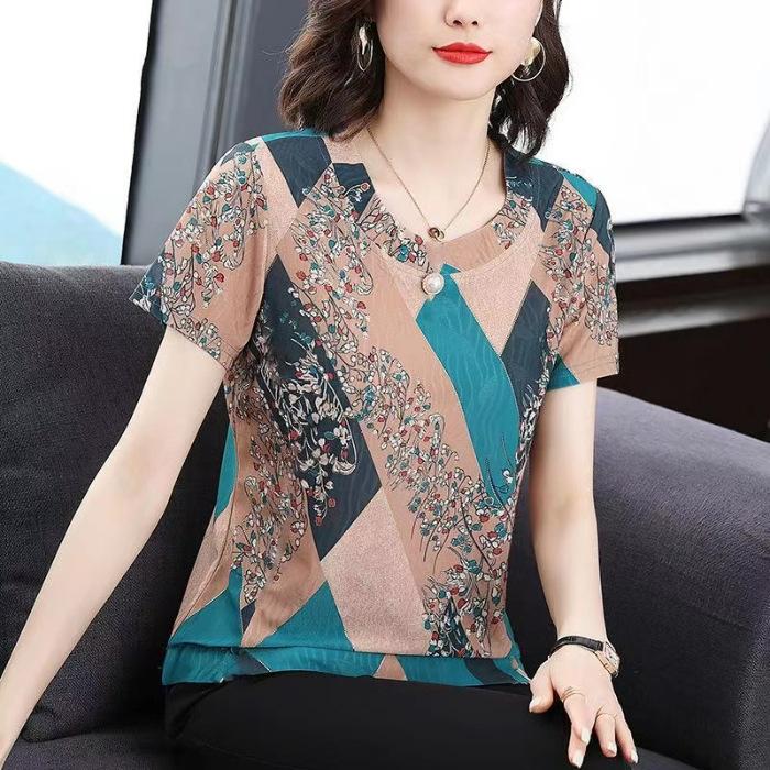 

Мама среднего возраста, одетая в свободный топ с короткими рукавами и принтом, летняя новая большая футболка большого размера, закрывающая живот, красивая футболка для женщин 3XL зелёный