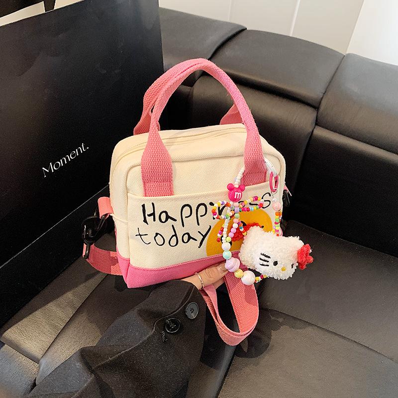 Cute spring girl handbag hand carry out niche small square bag Korean version fashion trend shoulder messenger bag