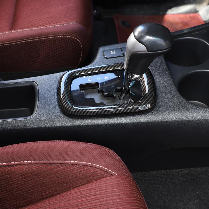 ABS plastic carbon fiber Car central control gear decorative frame sticker Suitable for Toyota Hilux 2015-2024 Accessories