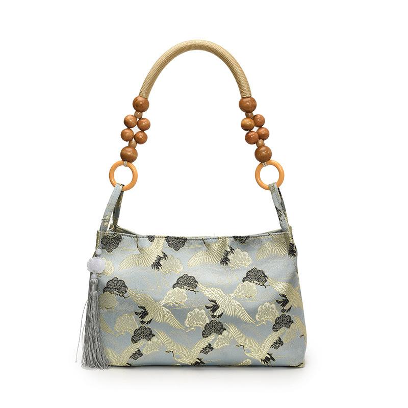 Nowa torba retro w chińskim stylu damska 2025 nowa casualowa niszowa torebka modna prosta torba na ramię poduszka