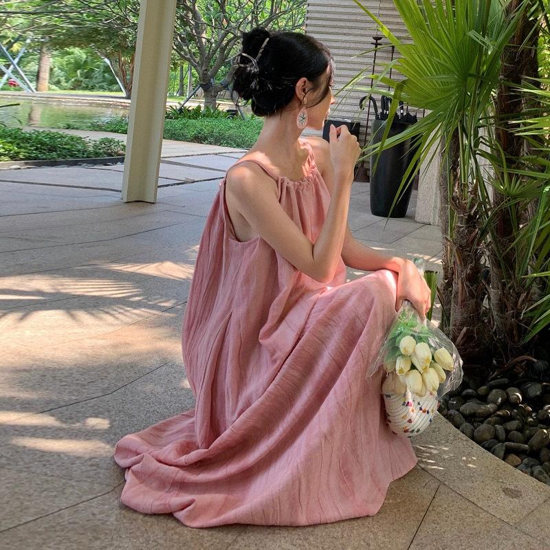 Seaside vacation pink sleeveless suspender dress loose lazy wind summer new sweet and spicy skirt women