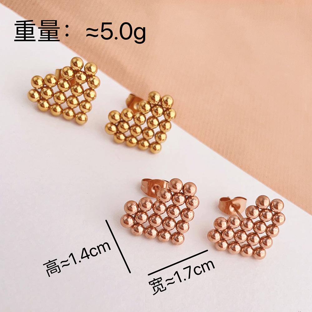 French personality trend niche peach heart stud earrings commuter versatile titanium steel earrings female niche