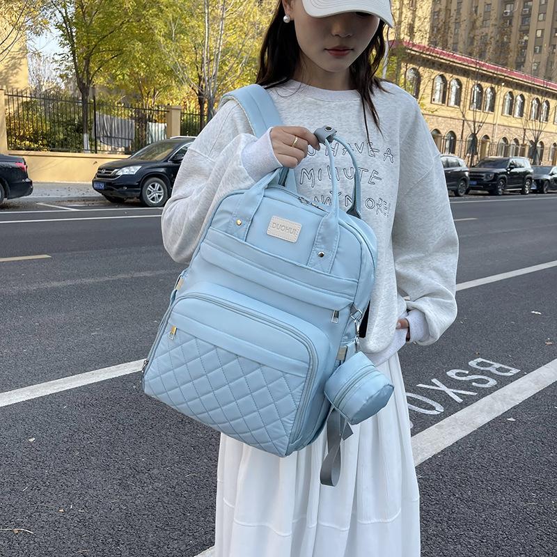 Schoolbag new wholesale mommy bag double shoulder urine pad large capacity thermal insulation lightweight mother and baby bag can be customized LOGO