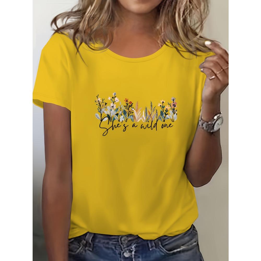 Women's Casual Short Sleeved Round Neck T-shirt with Vibrant Blue Floral Print Featuring "She's Wild At Heart" Reference To Women's T-shirt