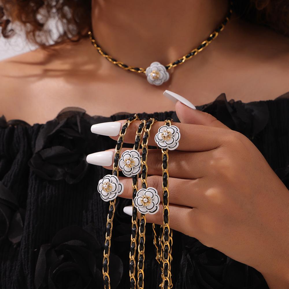 French Light Luxury Black Woven Leather Rope Titanium Steel Necklace Versatile Niche Camellia Shape Diamond Neck Chain Women