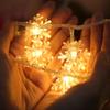 CESOF Christmas Decorations Lights, 20 Ft 40 LED Snowflake String Lights Battery Operated Fairy Lights for Bedroom Room Party Home Office Xmas Decor