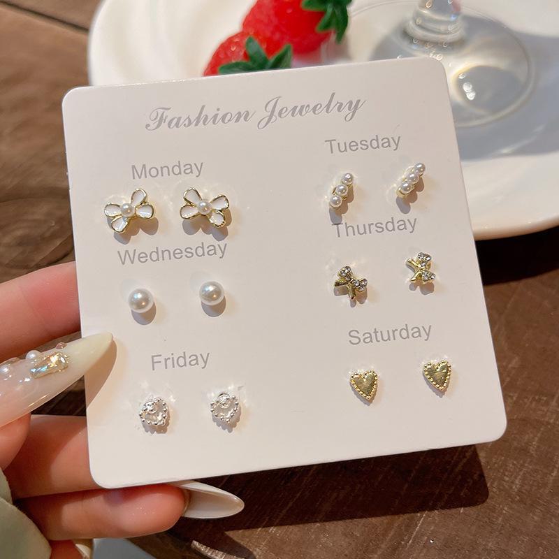 "Korean Style Pearl Ear Piercing Set: Small, Versatile Earrings for Students - Elegant and Simple High-End Jewelry"