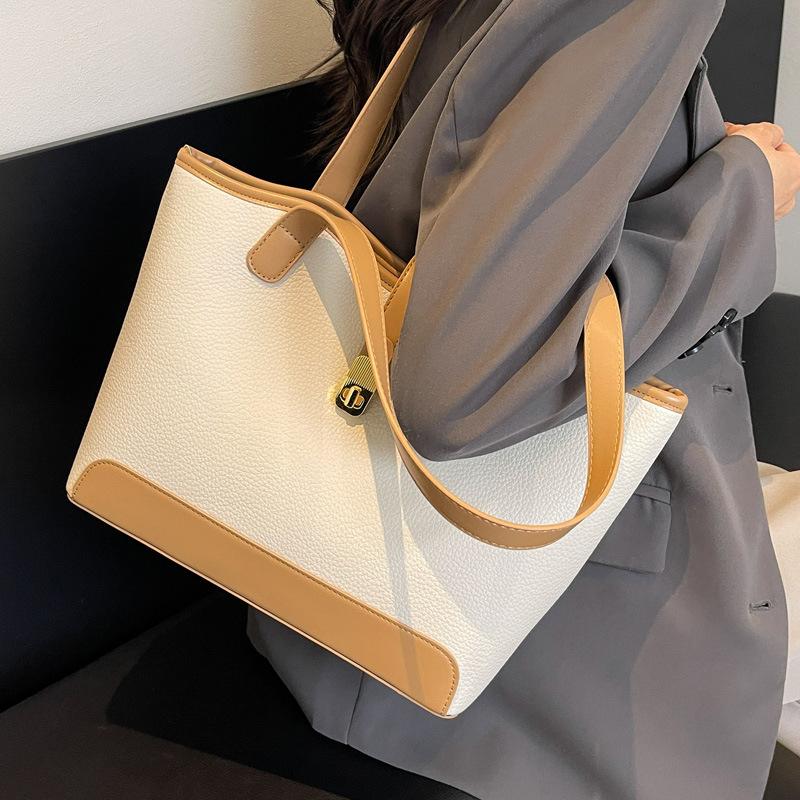 Casual tote bag women's large capacity 2025 new versatile shoulder commuter bag popular college student class bag this year