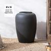 Jingdezhen Black Coarse Pottery Floor Vase: Modern Minimalist Japanese Decor for Hotel, Homestay, or Living Room.