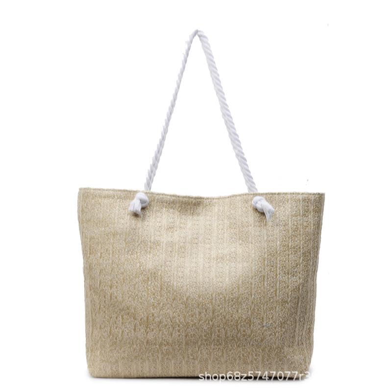 Seaside resort style woven straw bag women's 2025 new fashionable simple tote bag large capacity foreign style shoulder bag