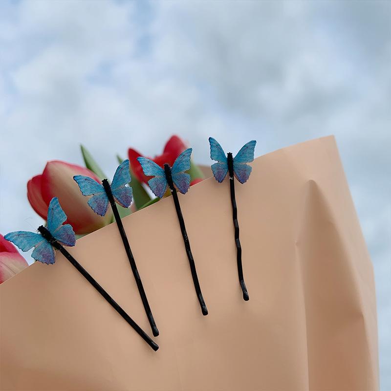 

Dreamy Retro Blue Butterfly Hair Clip - Sweet Side Bangs Accessory for Women