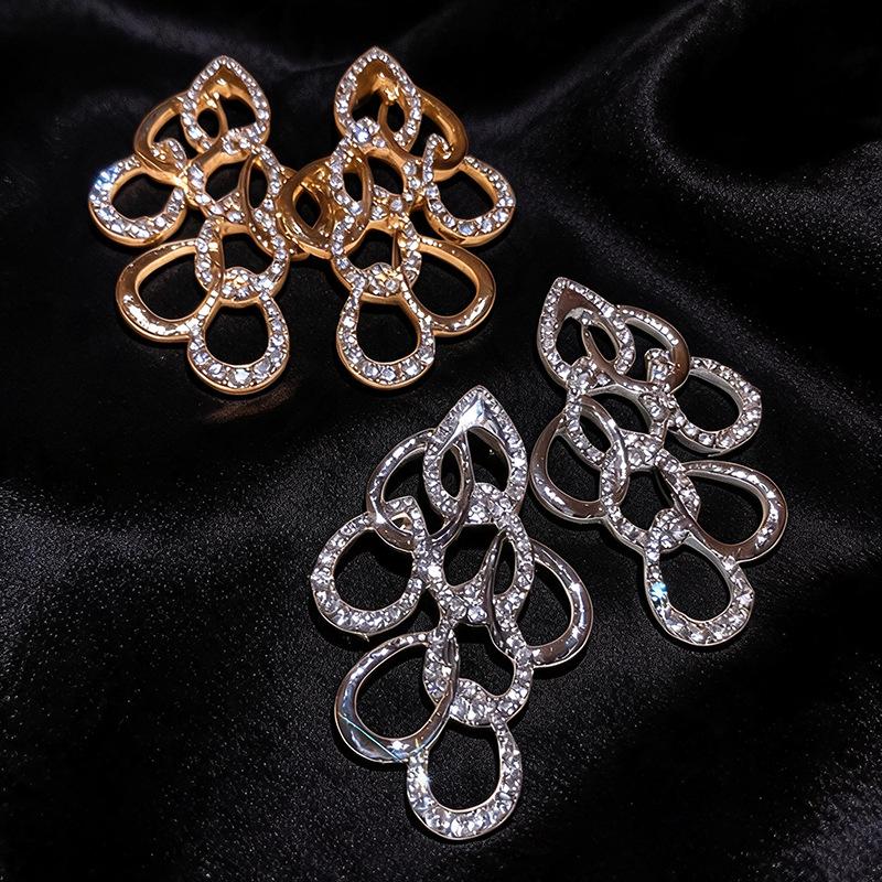 Elegant Water Drop Diamond Hollow Earrings - Silver Needle, European & American Style, Exaggerated Fashion, Luxurious High-End Design.