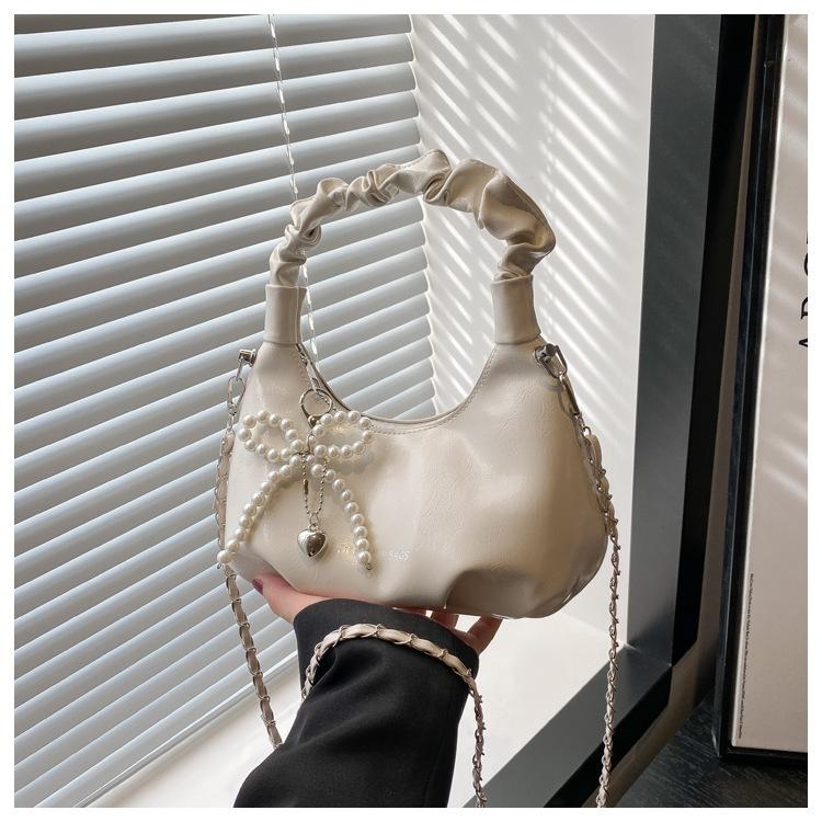 

Korean version of soft leather handheld cloud bag women s 2025 new foreign-style texture messenger versatile women s bag shoulder bag Without pendant білий