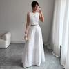 Nuovi abiti da donna primavera ed estate 2026 top bianco in pizzo corto senza maniche + gonna lunga elegante a vita alta a trapezio