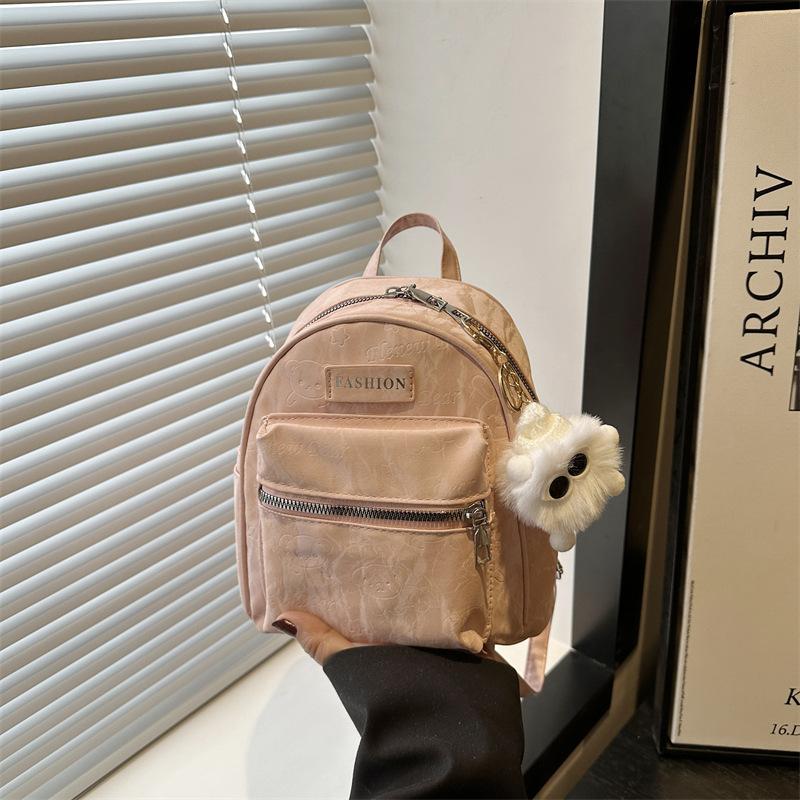 

Fashion travel small bag women 2025 new student niche light schoolbag women go to work small backpack Single pack розовый