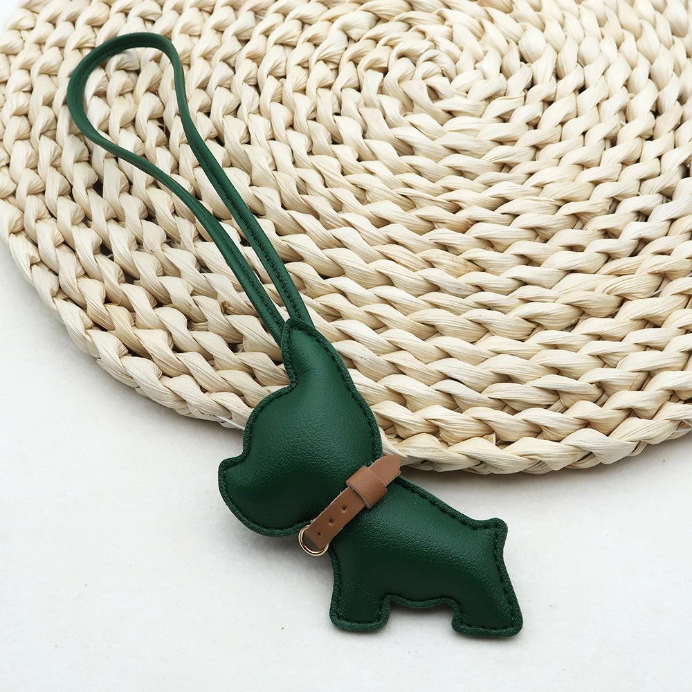 

Cross-border hot selling French fighting dog PU leather bag pendant creative bulldog accessories couple puppy car pendant pendant зелений