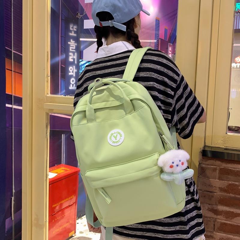 Japanese ins girl backpack Korean version of junior high school student schoolbag female tide large capacity solid color nylon handbag