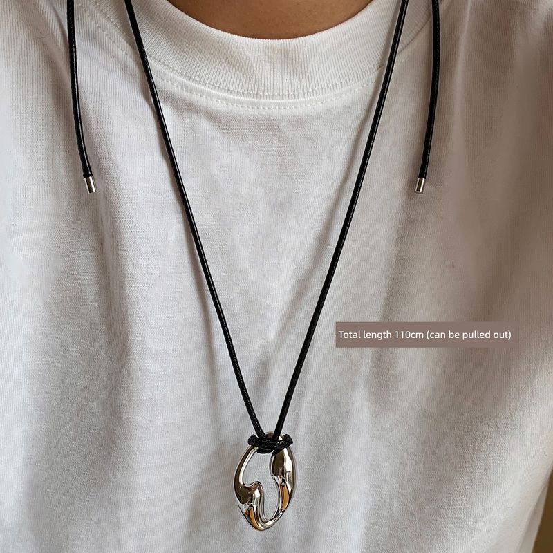 

and American Style Irregular Pendant Black Leather Cord Long Sweater Chain for Women, Spring and Summer Niche Design, Light Luxury High-End Necklace Silver