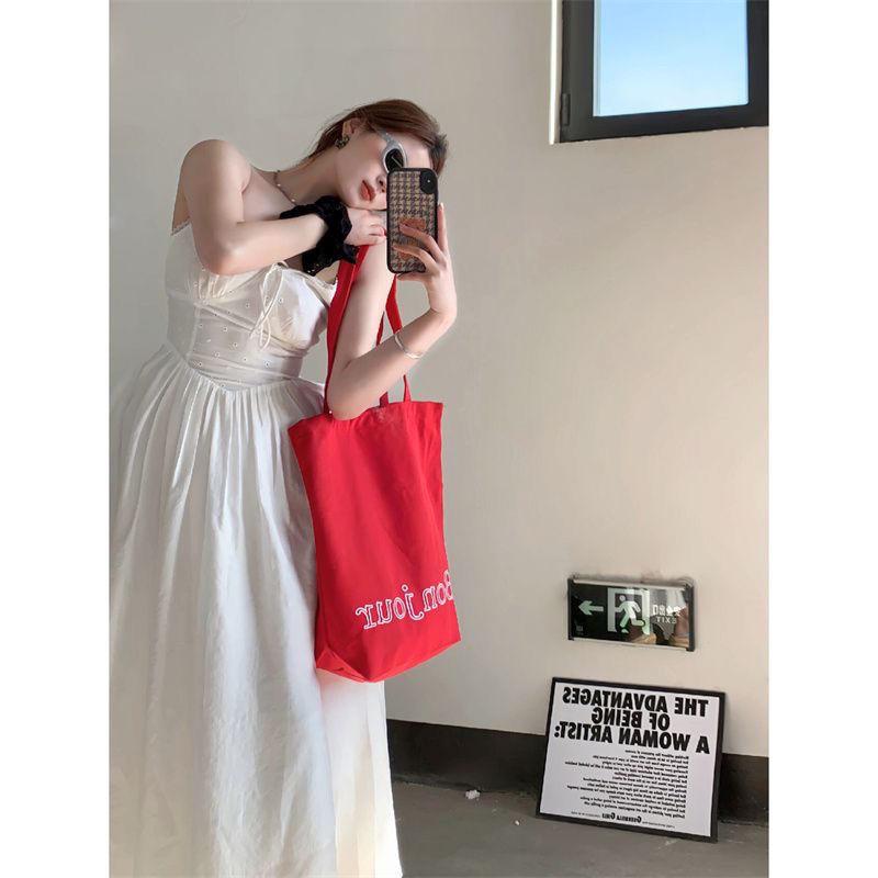 

Small fresh and lazy wind canvas bag women s 2025 new trendy high-value leisure going out portable shopping bag