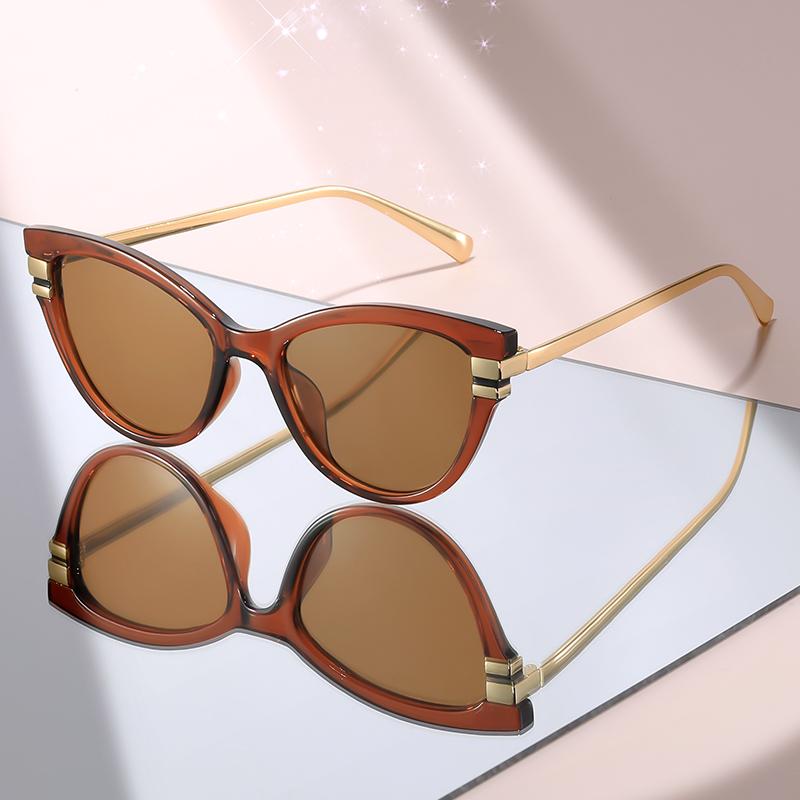 Fashion Cat Eye Sunglasses with Black Top Frame, Red Patterned Lower Frame, Gold Metal Arms, and Gradient Brown Lenses For