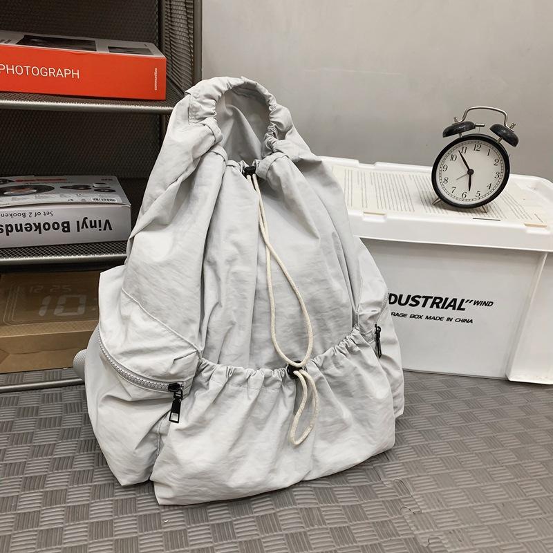 School bag new folding backpack multi-pocket bundle design simple solid color storage bag leisure travel couple backpack tide