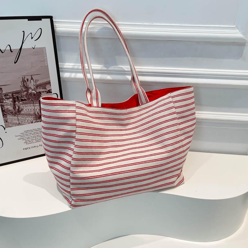 

Новый ретро нишевый дизайн повседневный весенний тренд 2025 большая вместимость сумка через плечо женская модная сумка-тоут для поездок на работу красный