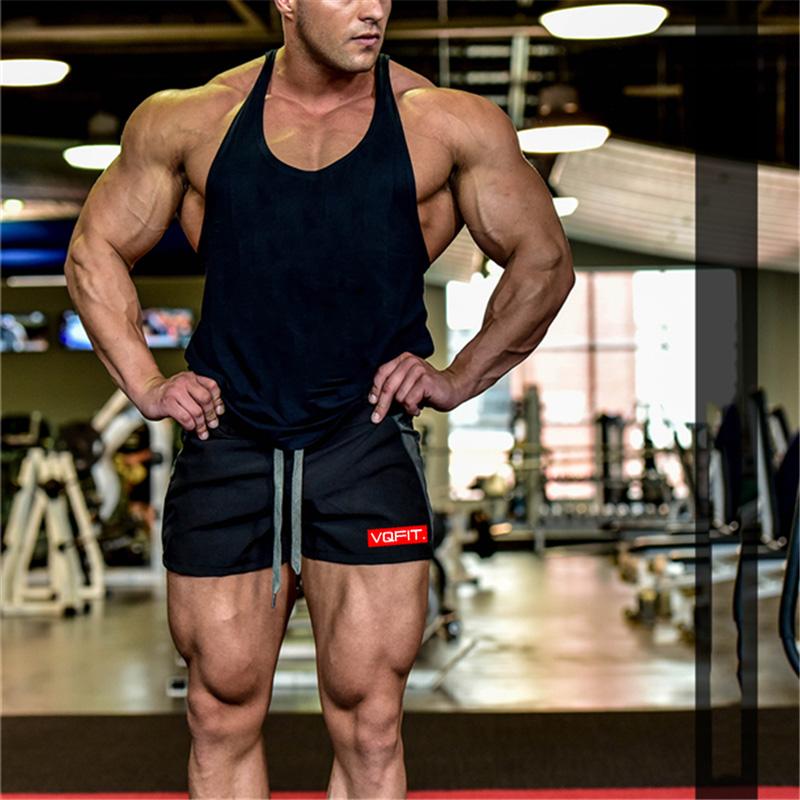 Muscleguys Summer Gyms Shorts Men Bermuda Beach Hot Cargo Simple Patchwork Solid Men Board Shorts Male Brand Fitness Mens Shorts