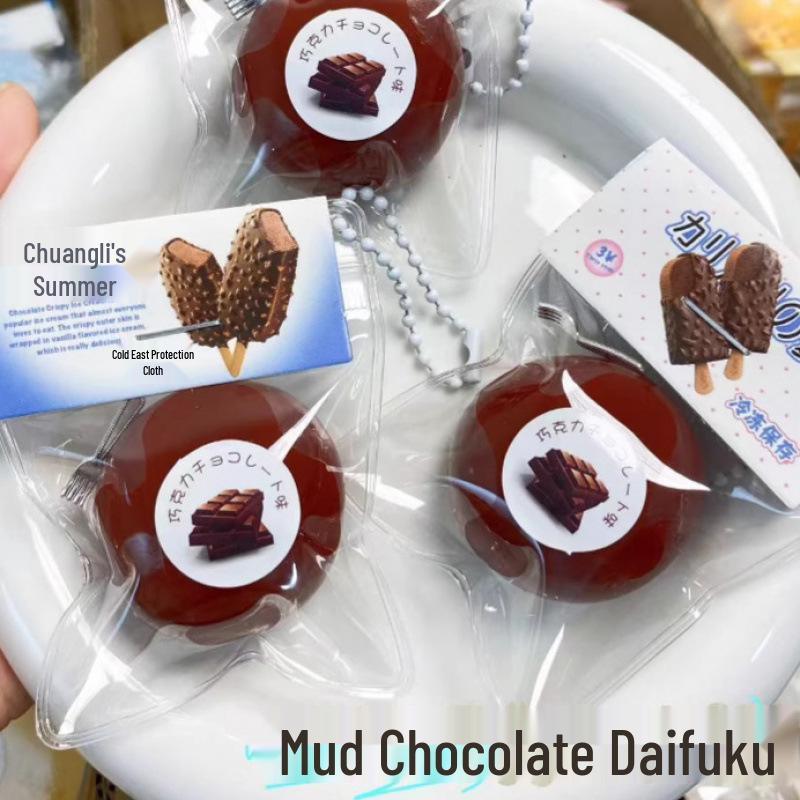 

Подвеска-сквиши Xiaohongshu: Игрушка-антистресс с дизайном шоколадного дайфуку и цинтуань