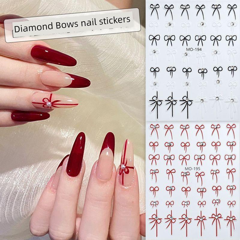 

Rhinestone Bows Nail Art Sticker Embossed New Year Red Classic Black and White Minimalist Nail Decorative Sticker Internet Hot One for each of the 2 paragraphs