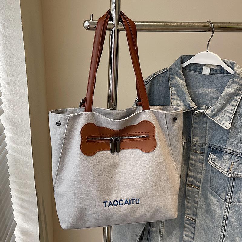 

Spring niche leisure personalized canvas tote bag female students class commuting versatile multi-back method backpack