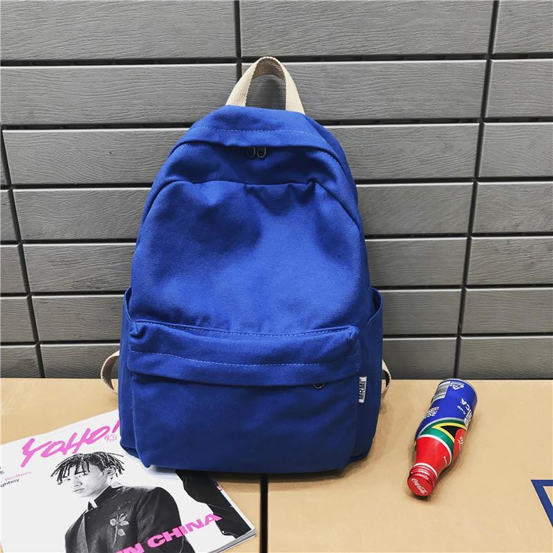 

Japanese small fresh canvas backpack girl simple solid color student schoolbag campus Harajuku style casual small backpack