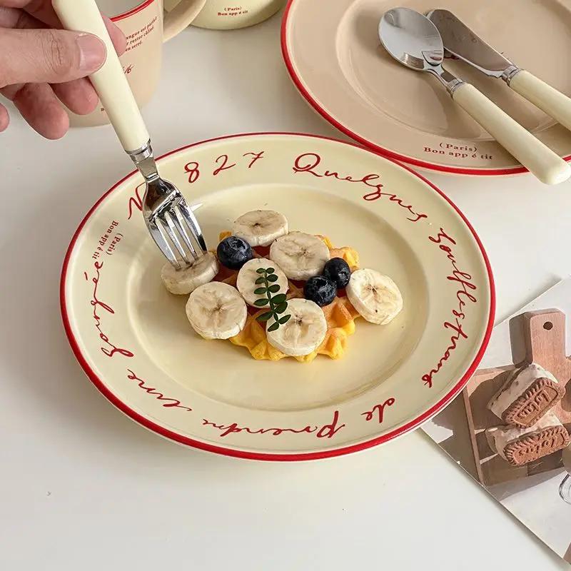 

Ретро французская буква плоская тарелка кафе коммерческая тарелка керамическая посуда стейк инвентарь сердце тарелка красивые украшения блюдо